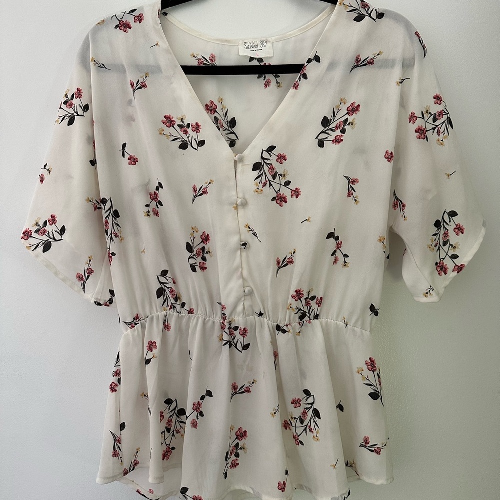 Sienna Sky short sleeve blouse